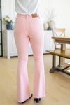 Judy Blue Feminine Flair Mid Rise Distressed Flares in Pastel Pink