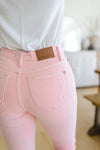 Judy Blue Feminine Flair Mid Rise Distressed Flares in Pastel Pink