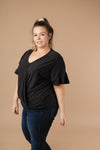 Nice Surprise Surplice Knit Top In Black