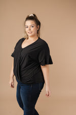 Nice Surprise Surplice Knit Top In Black