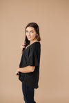 Nice Surprise Surplice Knit Top In Black