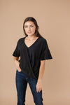 Nice Surprise Surplice Knit Top In Black