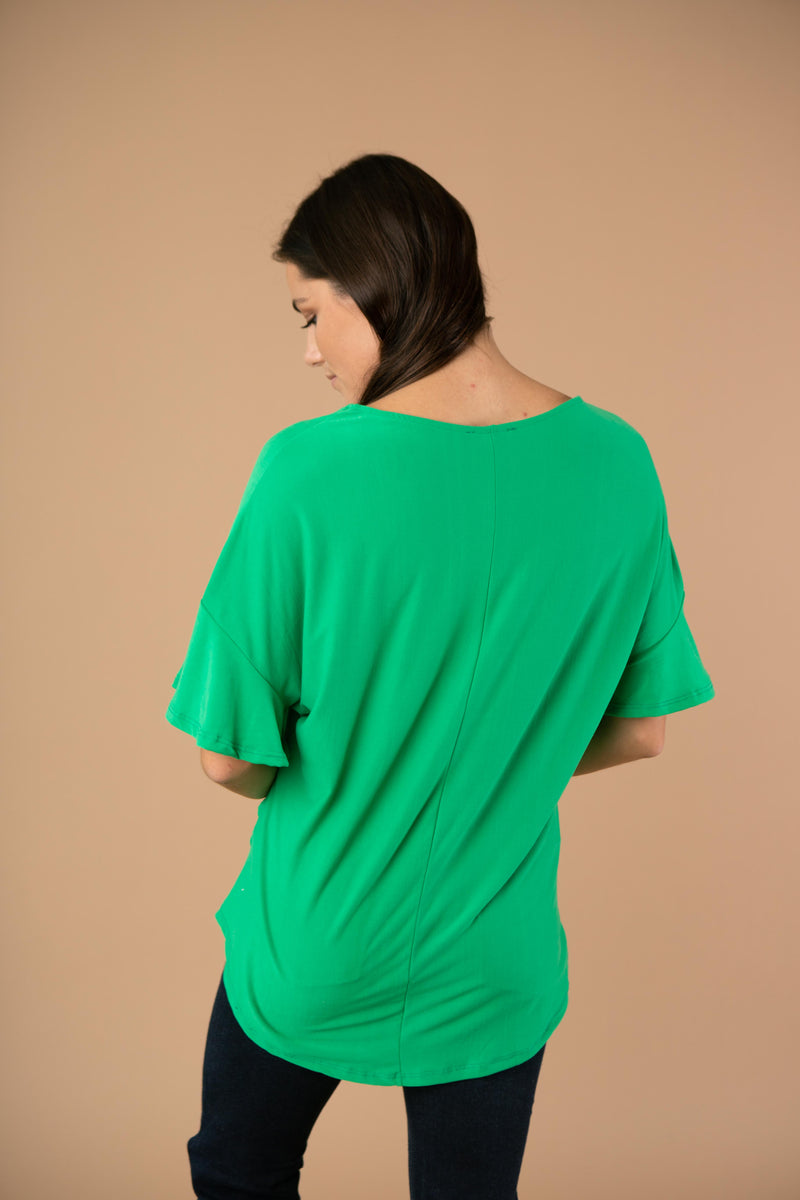 Nice Surprise Surplice Knit Top In Kelly Green