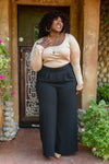 Up To Date Pleated Wide Leg Pants In Black